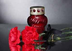 Memory lantern with candle,  carnations and black ribbon