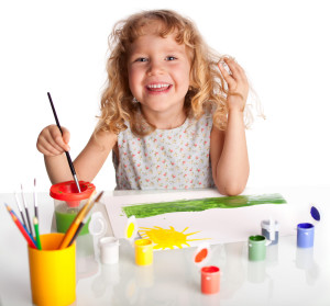 Littl child, drawing paint. Isolated on white